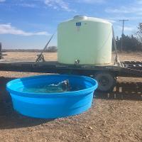 Hauling water and moveable plastic tank