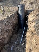 A view of a wet well installed on private land