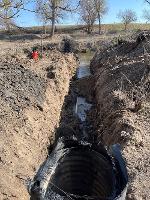 A view of a wet well installed on private land