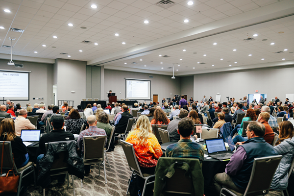 A full crowd listens to opening remarks by Governor Laura Kelly at the Ogallala Summit in 2024.