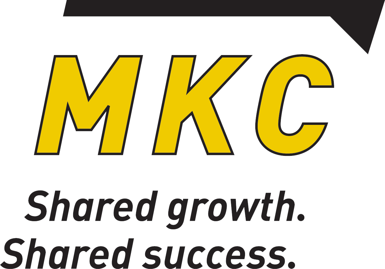 A thick black line above the letters MKC in bold yellow, followed by the phrase "shared growth, shared success"